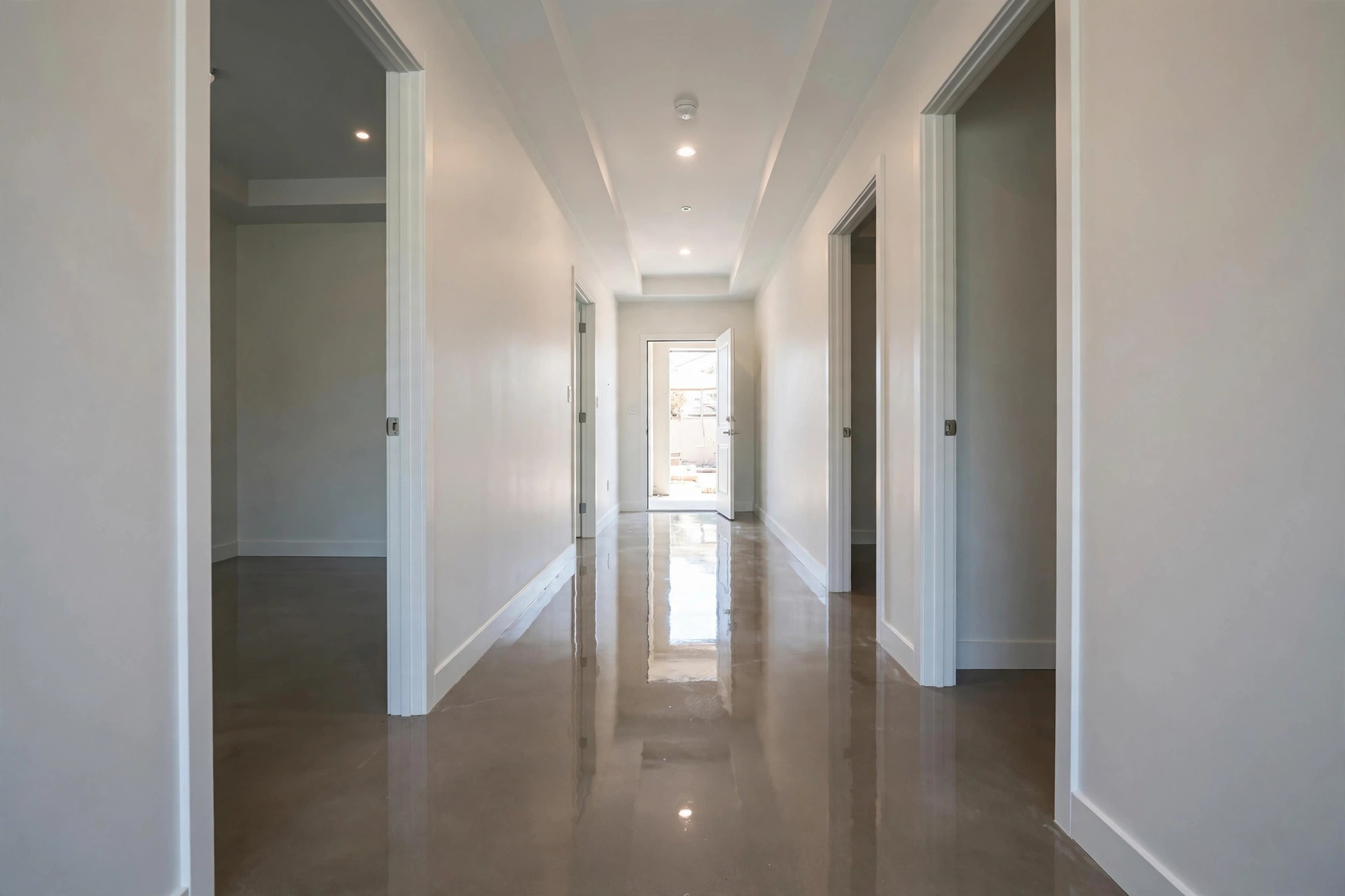 Empty hallway with gleaming floors after a move-out cleaning by South Sound Cleaning Co.
